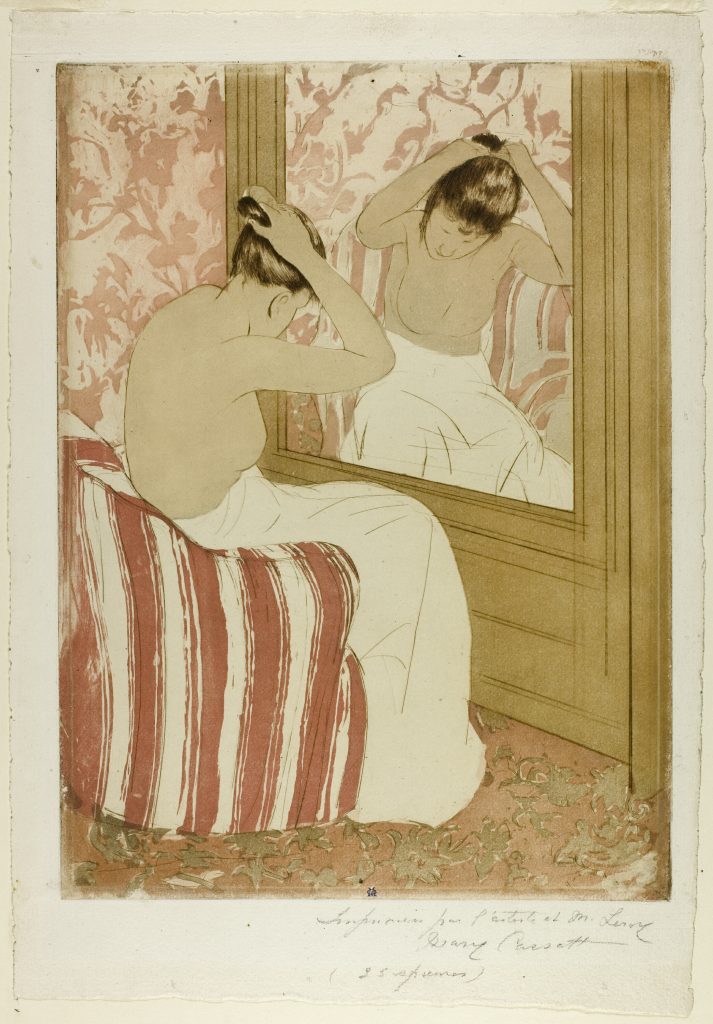 Woman fixing her hair